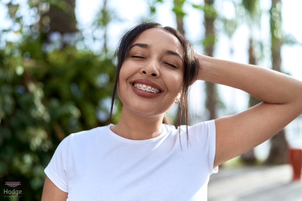 young arab woman with metal braces breathing closed eyes street - How Long Do Braces Take in Little Rock, AR 